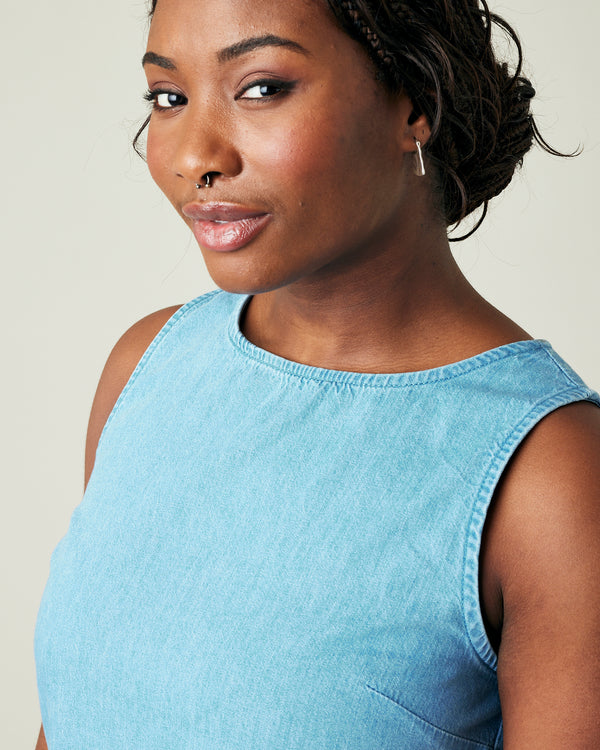 model wears light wash chambray esme top