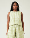 model wears apple check linen esme top