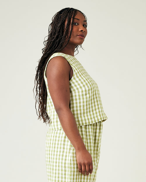 model wears apple check linen esme top