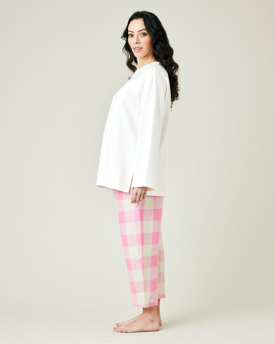 pregnant model wears pinks and ecru mega check ultimate pj linen trousers