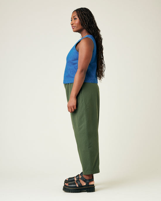 model wears khaki seersucker mabel trousers