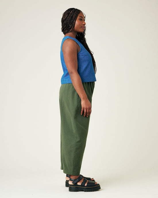 model wears khaki seersucker mabel trousers