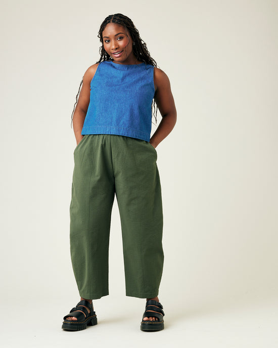 model wears khaki seersucker mabel trousers