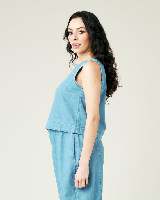 pregnant model wears light wash chambray esme top