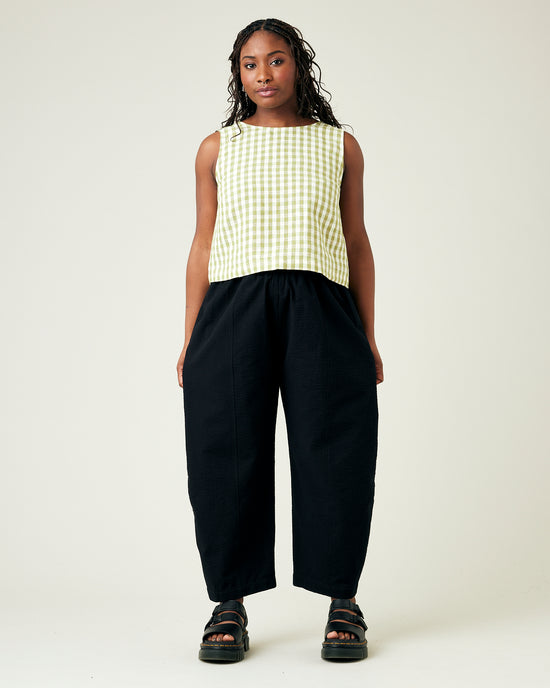 model wears black seersucker mabel trousers