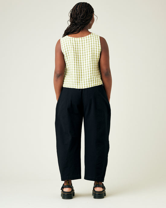 model wears black seersucker mabel trousers