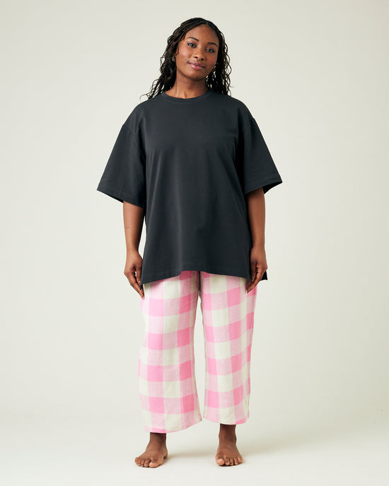 model wears pinks and ecru mega check ultimate pj linen trousers