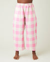 model wears pinks and ecru mega check ultimate pj linen trousers