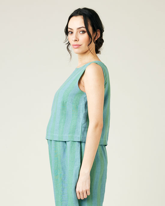 pregnant model wears ocean stripe linen esme top