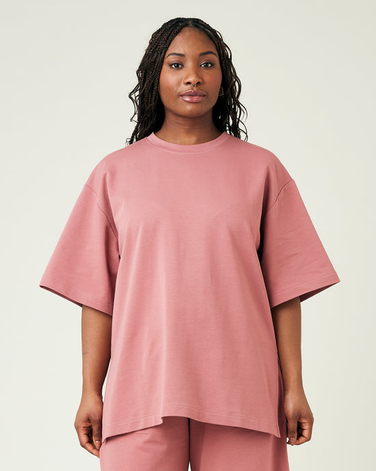 model wears dusty pink jersey jude top