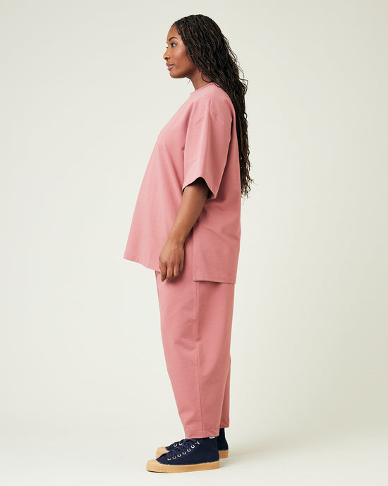 model wears dusty pink huxley jersey trousers