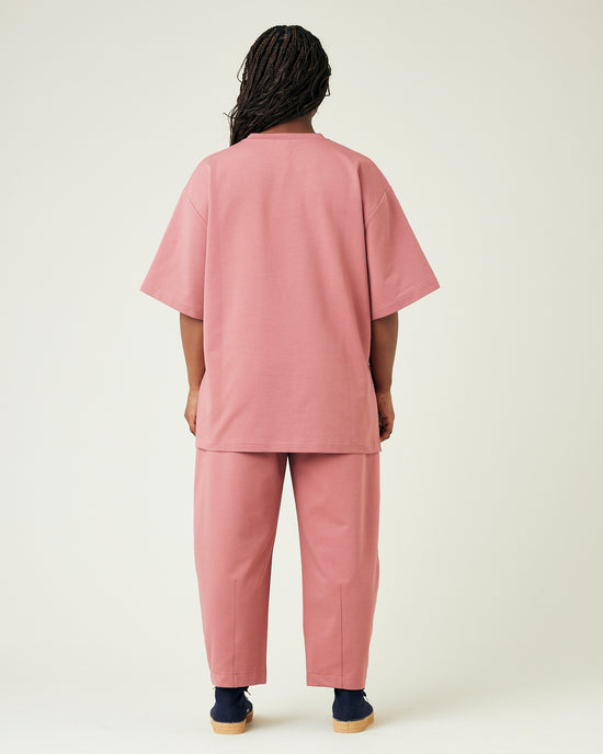 model wears dusty pink huxley jersey trousers