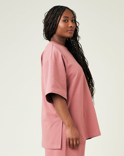 model wears dusty pink jersey jude top