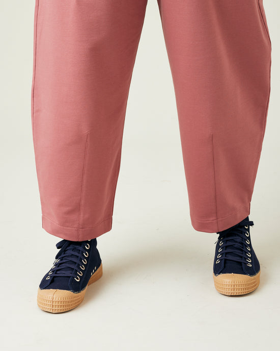 model wears dusty pink huxley jersey trousers