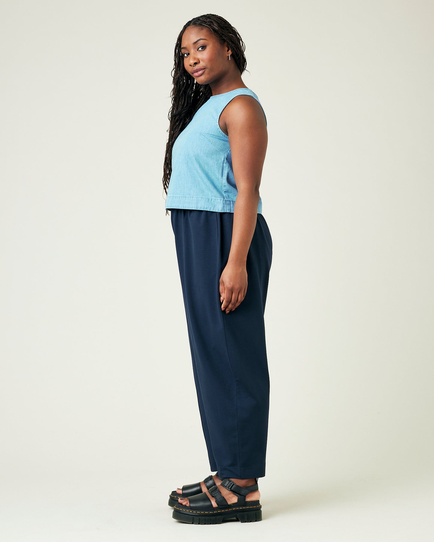 model wears navy jersey mabel trousers