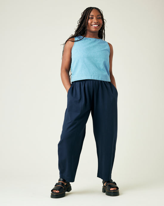 model wears navy jersey mabel trousers