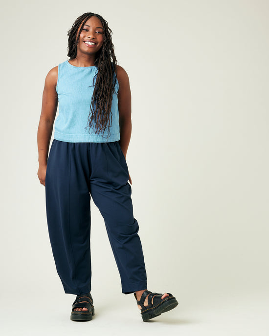 model wears navy jersey mabel trousers