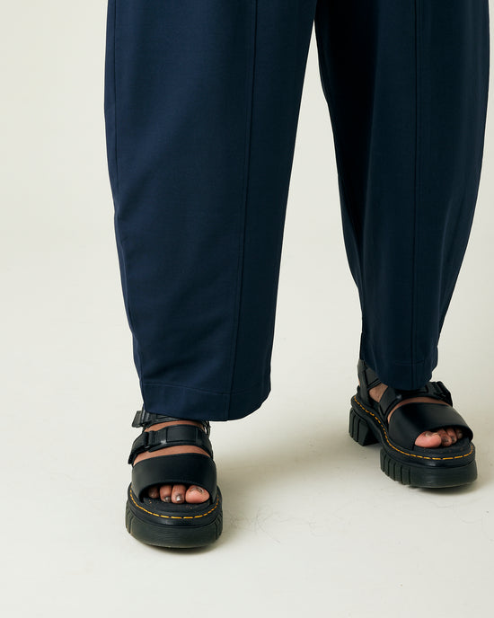 model wears navy jersey mabel trousers