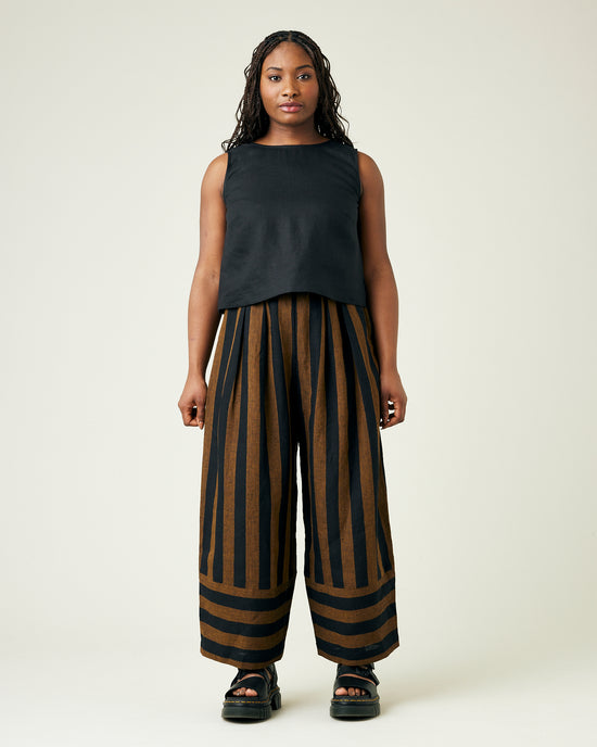 model wears rust stripe bobbi trousers