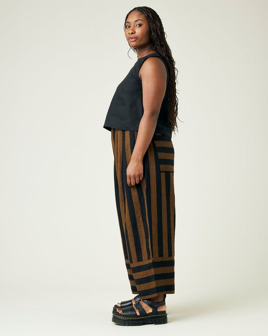 model wears rust stripe bobbi trousers