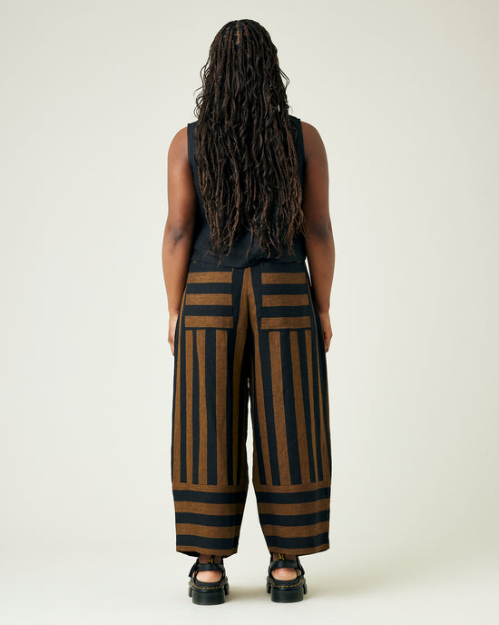 model wears rust stripe bobbi trousers