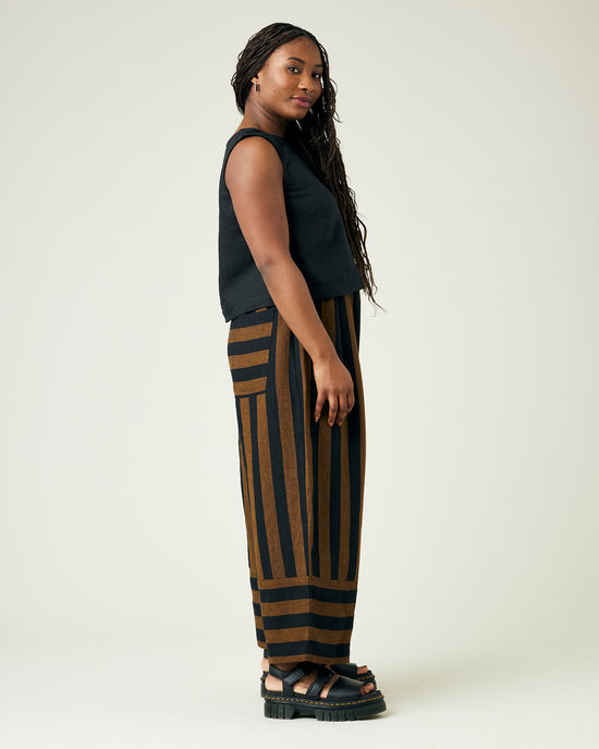 model wears rust stripe bobbi trousers