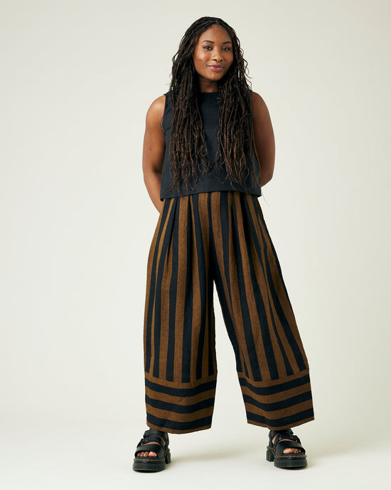 model wears rust stripe bobbi trousers