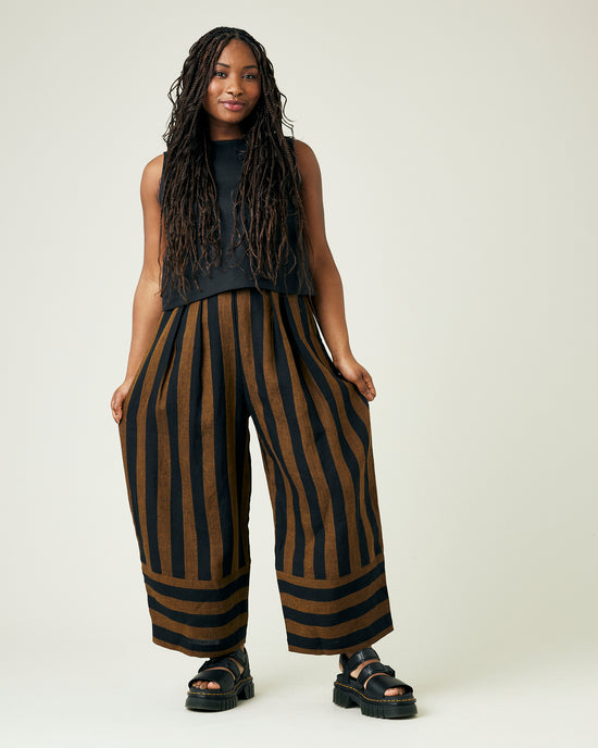 model wears rust stripe bobbi trousers