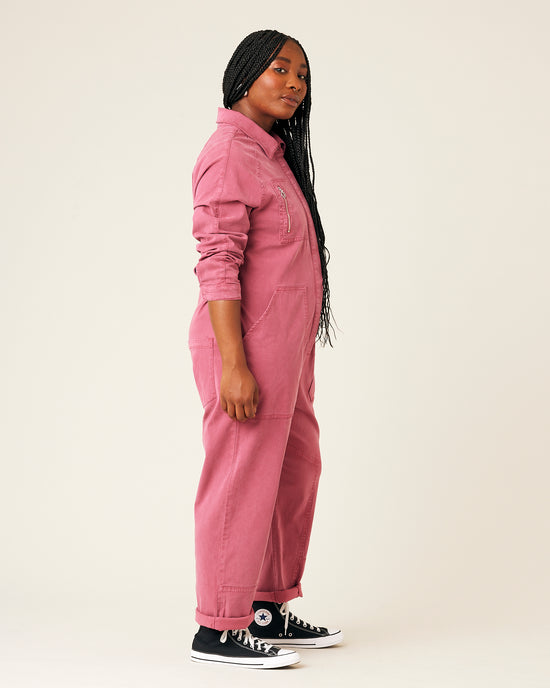 model wears pink hallie jumpsuit