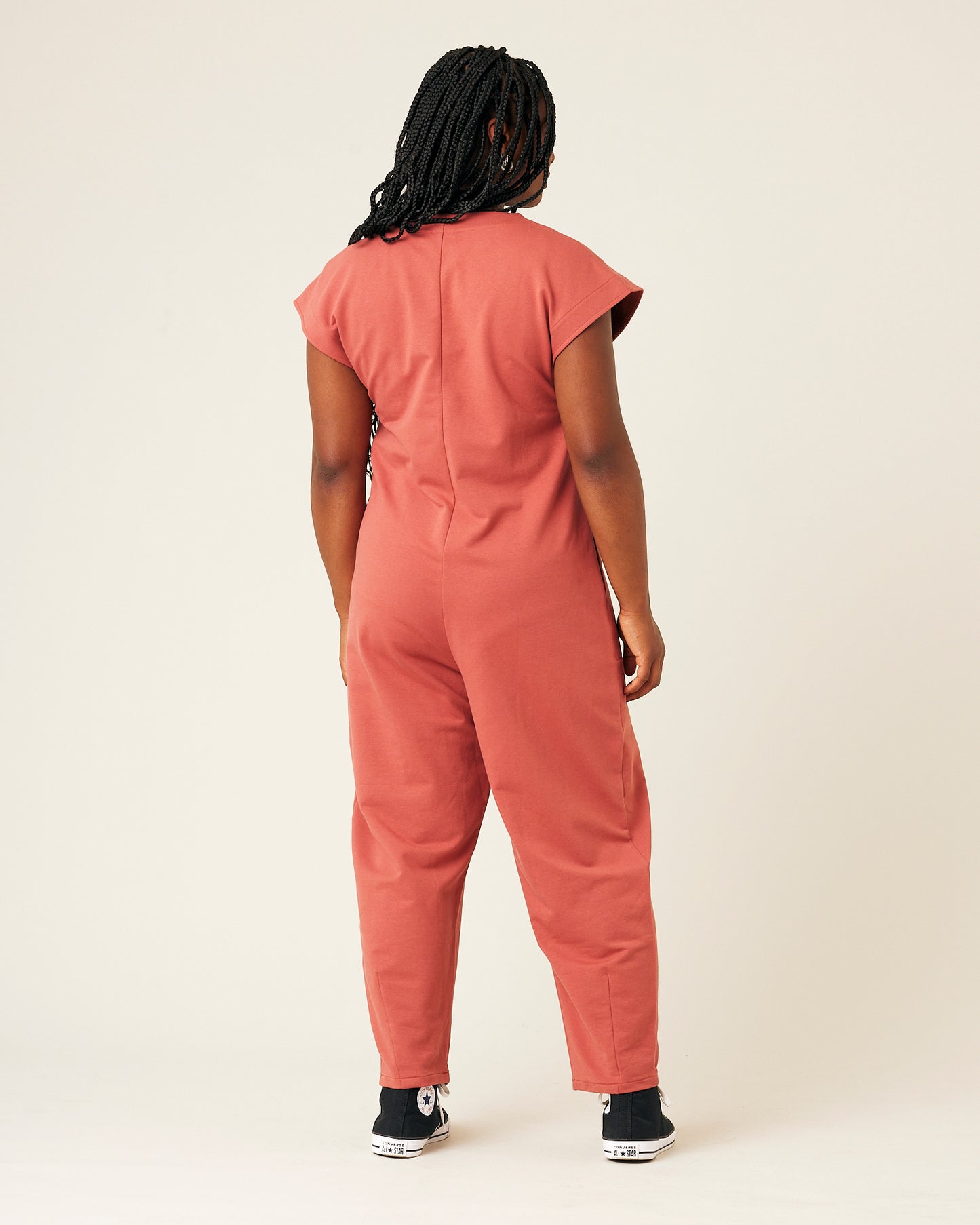 model wears brick jersey frankie jumpsuit