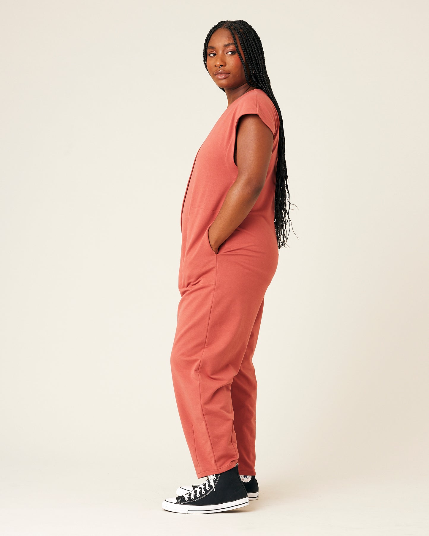 model wears brick jersey frankie jumpsuit