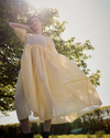model wears prue butter organza dress