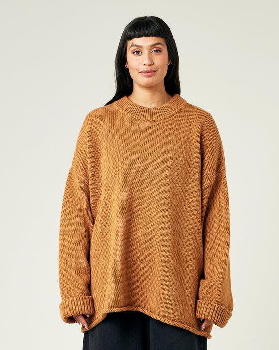 model wears camel knitted avery jumper