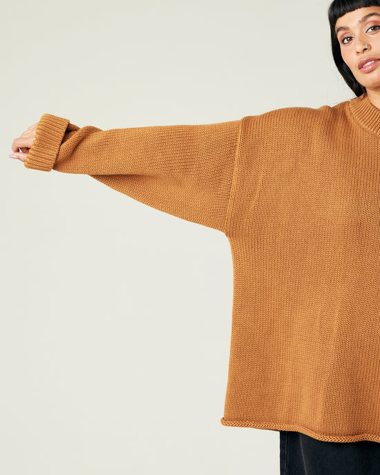 model wears camel knitted avery jumper