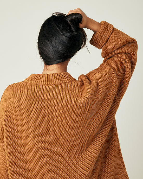 model wears camel knitted avery jumper