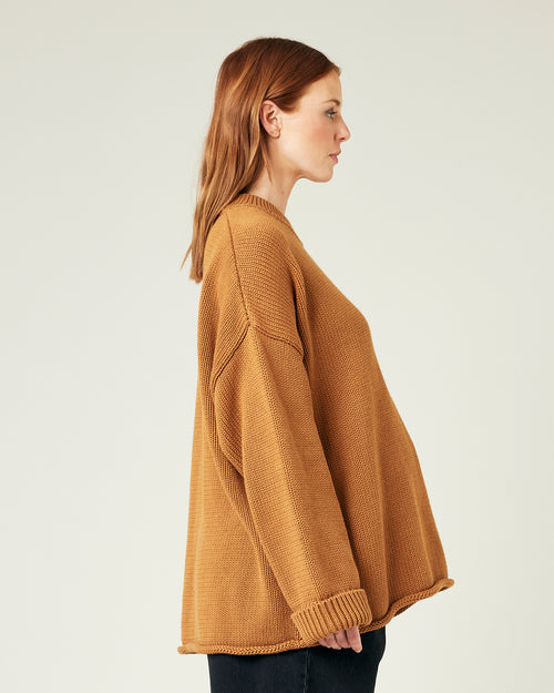 pregnant model wears camel knitted avery jumper