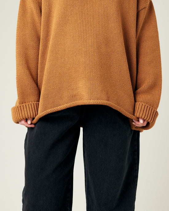 model wears camel knitted avery jumper