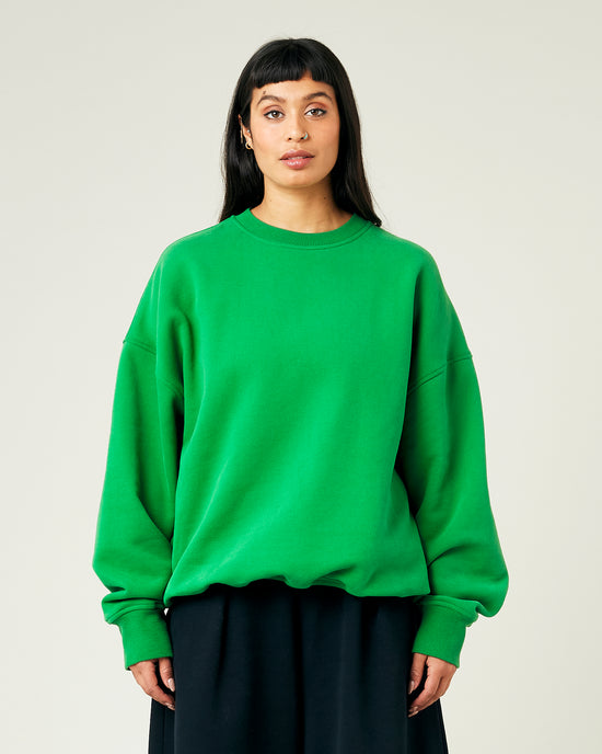 model wears juniper green jersey riley jumper