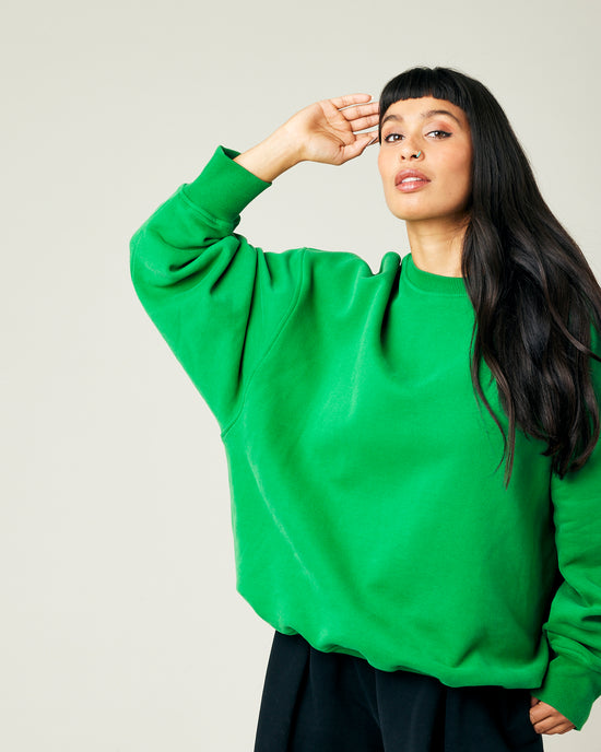 model wears juniper green jersey riley jumper