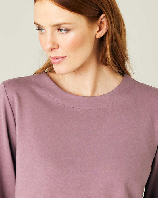 pregnant model wears dusty mauve jersey  wren top