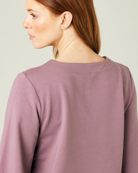 pregnant model wears dusty mauve jersey  wren top