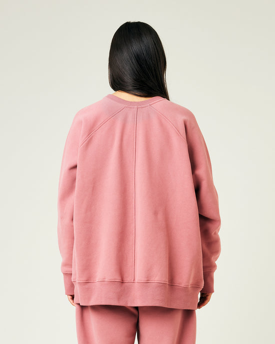 model wears dusty pink jersey hugh jumper