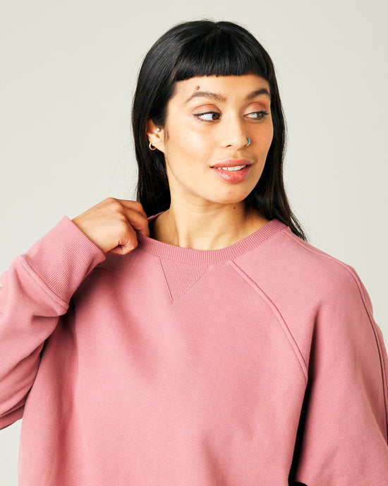 model wears dusty pink jersey hugh jumper