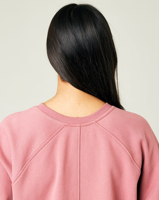 model wears dusty pink jersey hugh jumper