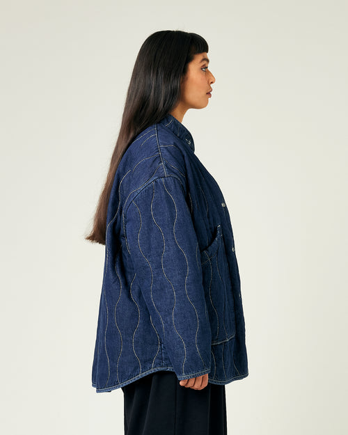 model wears dark wash denim rue jacket