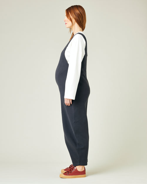 pregnant model wears slate jersey clover jumpsuit