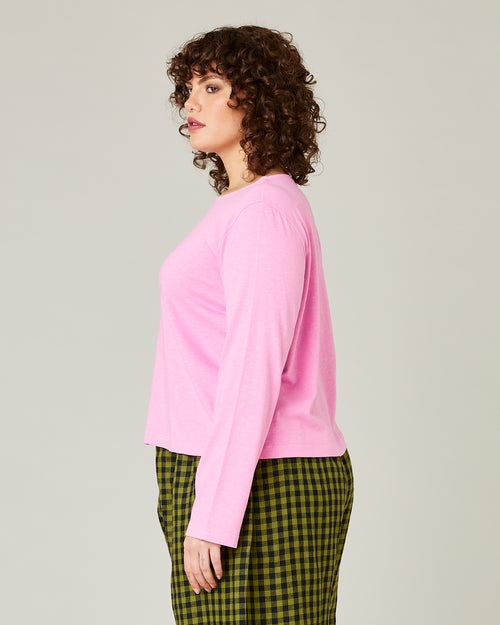 model wears bubblegum pink boat neck top