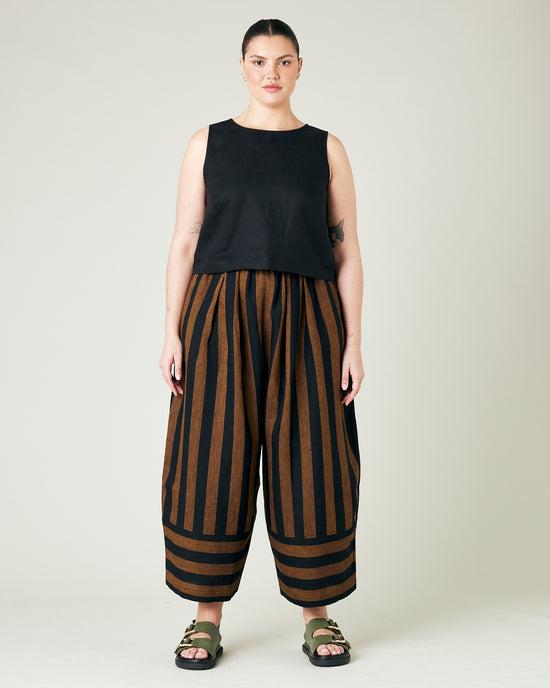 model wears rust stripe bobbi trousers