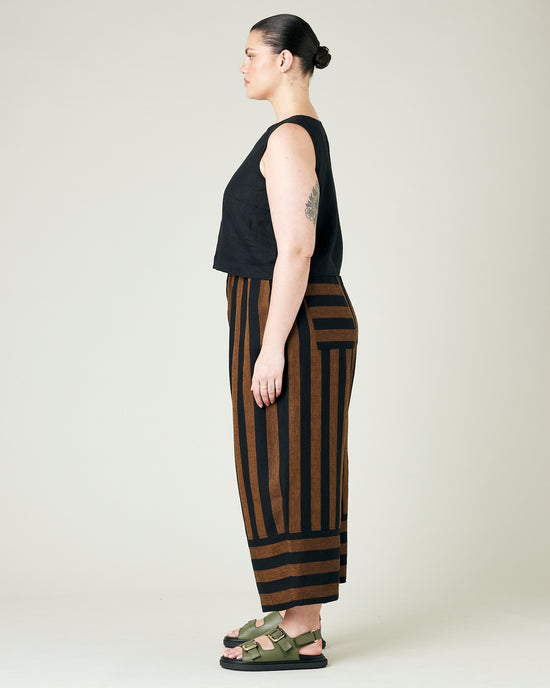 model wears rust stripe bobbi trousers