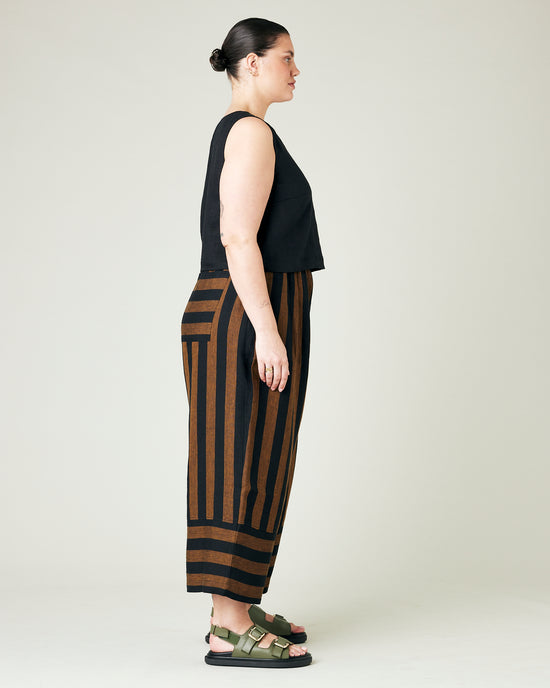 model wears rust stripe bobbi trousers